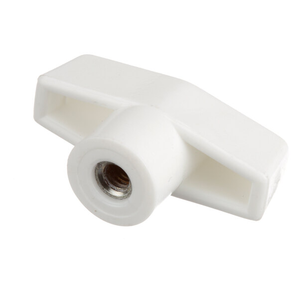 A close-up of a white plastic knob with a screw.