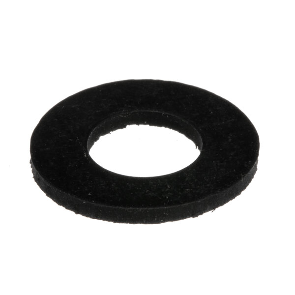 A black rubber ring with a hole on a white surface.