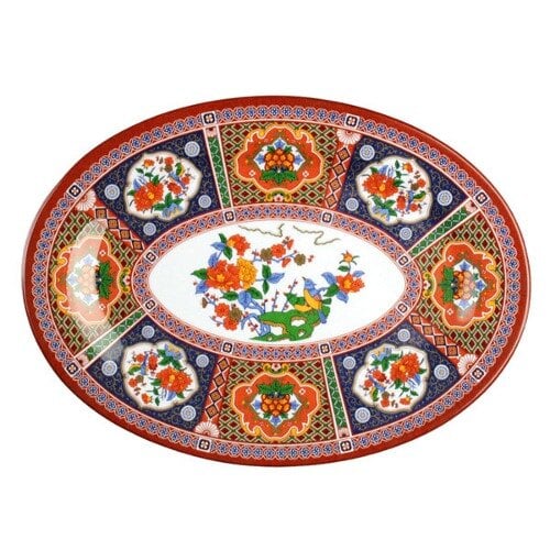 An oval Thunder Group melamine platter with a colorful peacock design on it.
