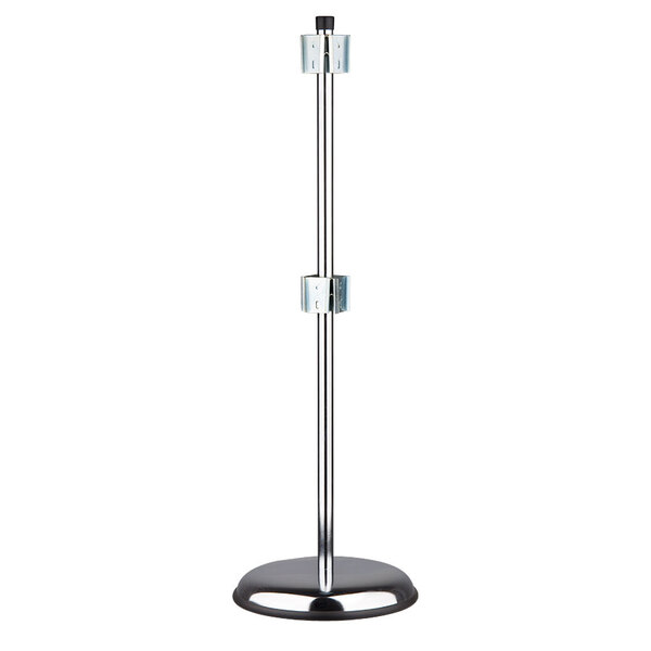 A San Jamar revolving cup and lid dispenser stand with a black base and chrome metal pole.