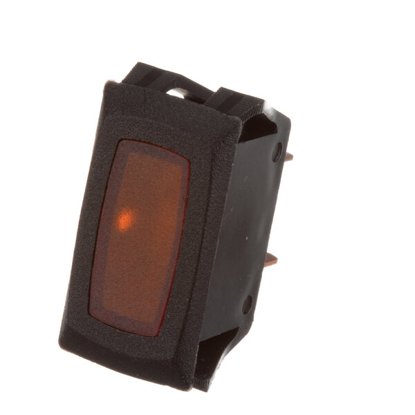 A close-up of a Groen black and orange rocker switch with a red light.