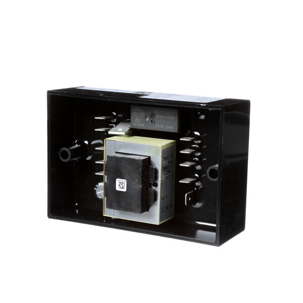 A black rectangular electrical device inside a black box.