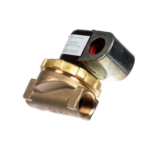 A close-up of a Jackson brass solenoid valve.