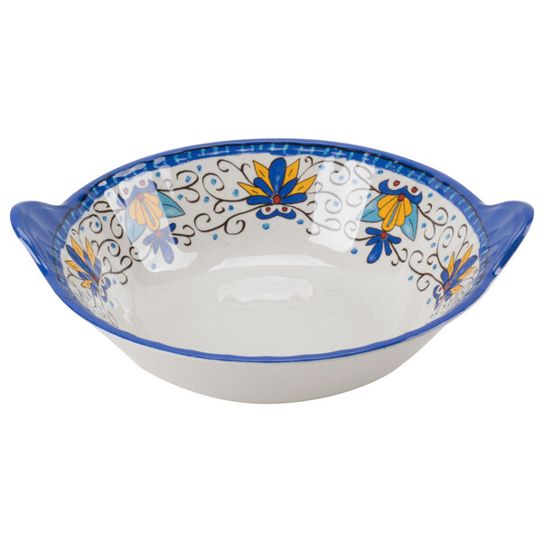 A white melamine bowl with blue and yellow Santa Lucia floral design.