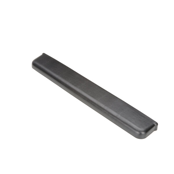 A long black rectangular plastic lid with a metal handle.