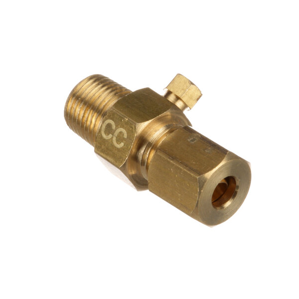 A close-up of a brass threaded valve with a gold nut.