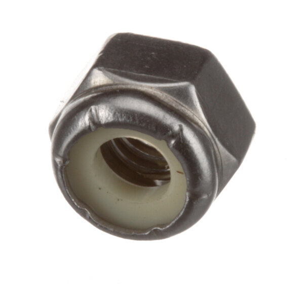 A close-up of a Blakeslee stop nut with a white cap.