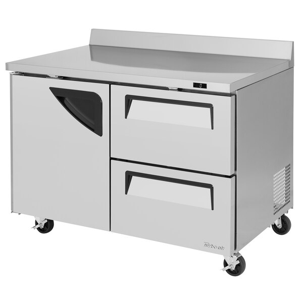A stainless steel Turbo Air worktop freezer with one door and two drawers.