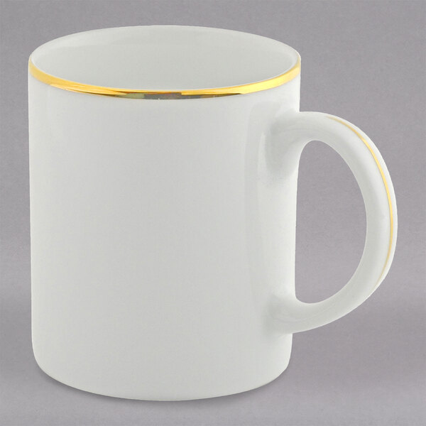 A white porcelain C-handle mug with gold trim on the rim.