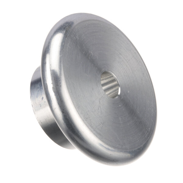 A close-up of a silver metal circular knob.