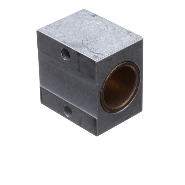A metal block with a hole.