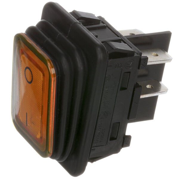 An orange and black rectangular Franke rocker switch.