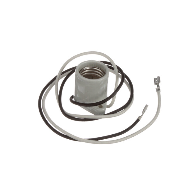 A white Gold Medal lamp socket with white and black wires.