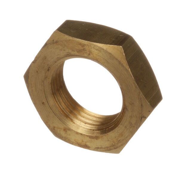 A close-up of a brass nut.