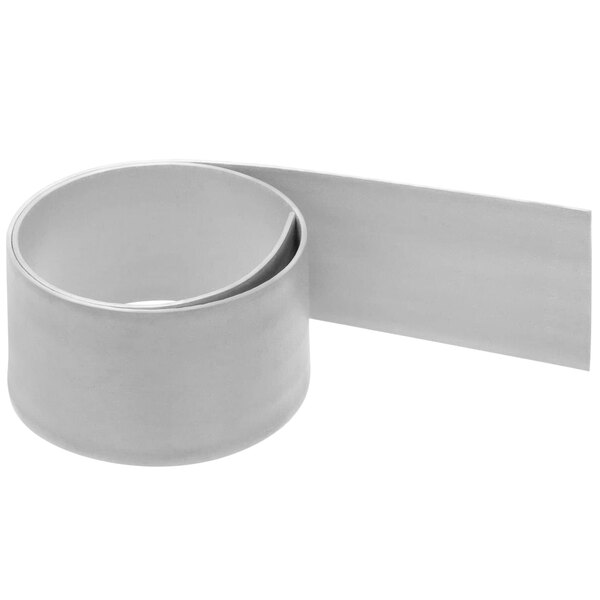 A roll of white neoprene strip on a white background.
