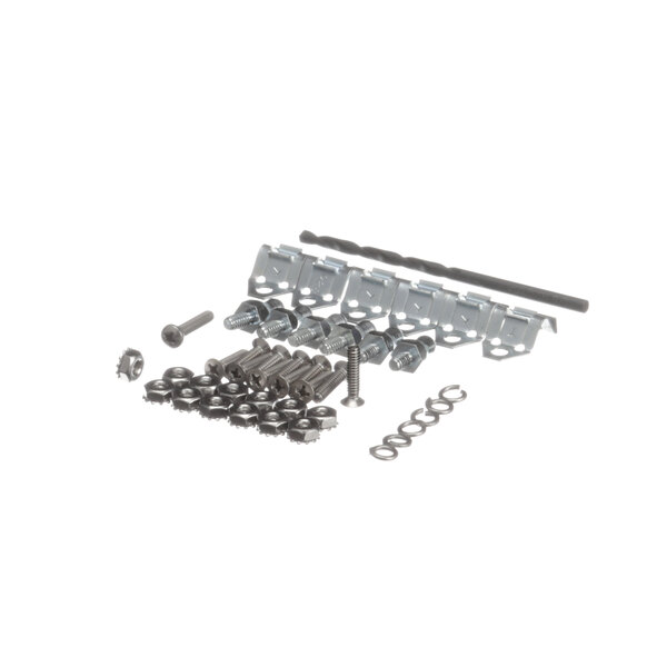 A group of screws and nuts in a TurboChef service kit.