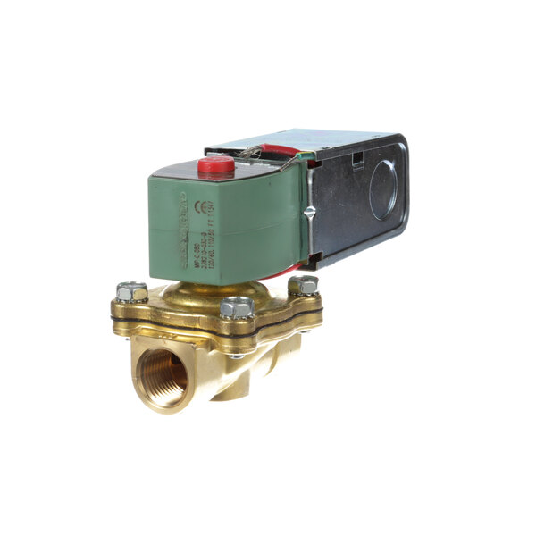 A close up of a brass Salvajor solenoid valve with a green button.