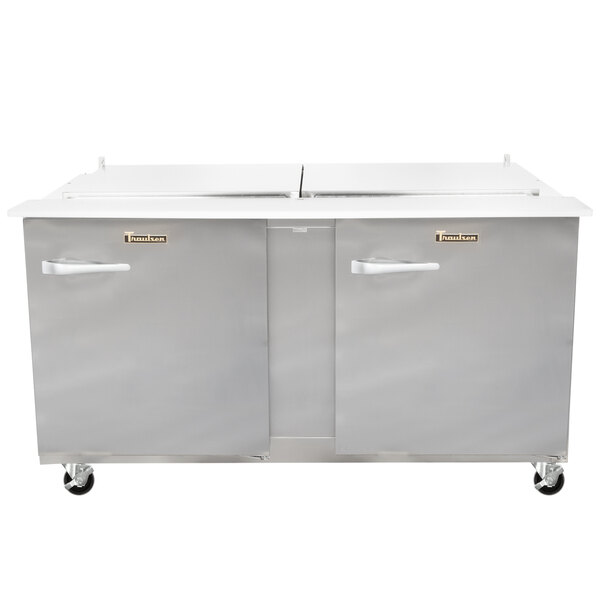 A large stainless steel Traulsen refrigerator with two right hinged doors.