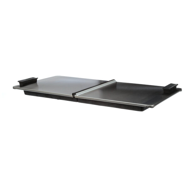 A black metal rectangular lid with a handle.