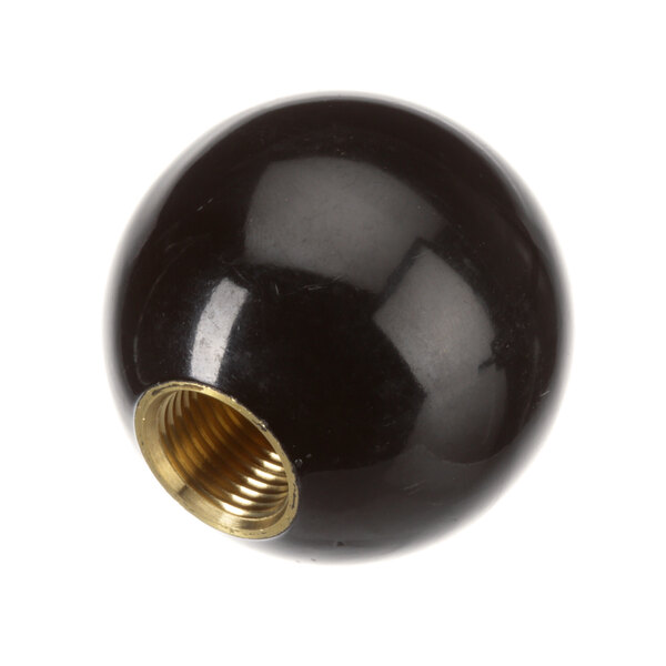 A black ball knob with a gold insert.