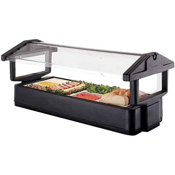 A black plastic Cambro table top food and salad bar with a sneeze guard over food on a counter.