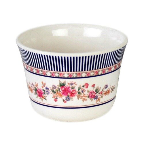A white bowl with blue stripes and flowers on it.