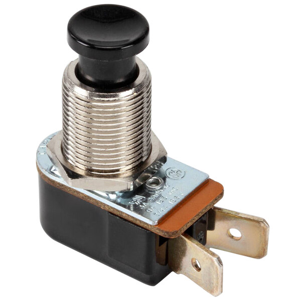 A black and silver push button switch with a black knob.
