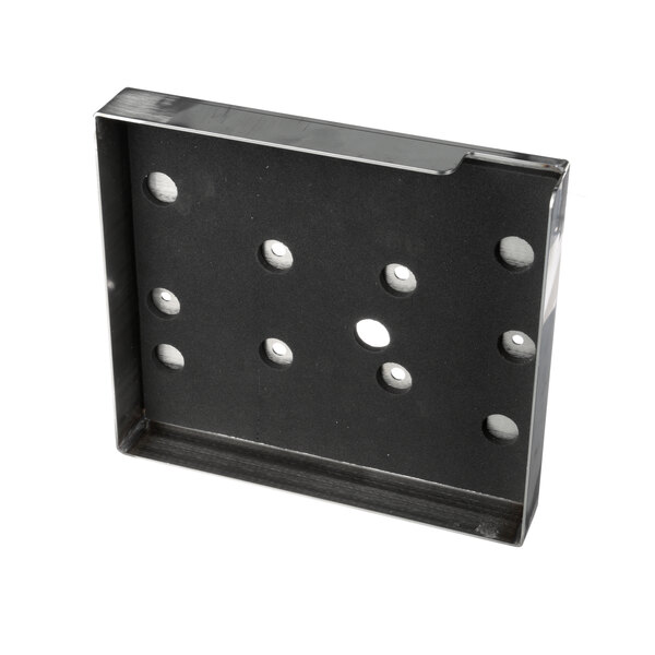 A black metal plate with holes.