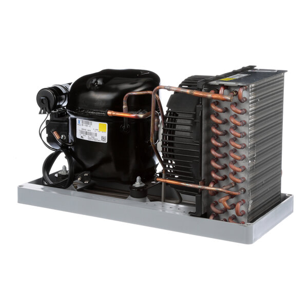 A Randell condensing unit with a copper coil and copper pipes.