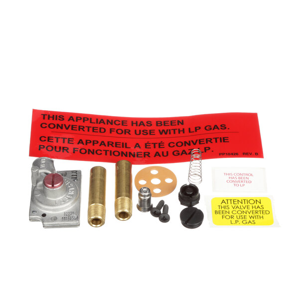 An Anets gas valve and other parts on a kitchen counter.