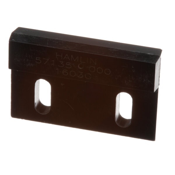A black rectangular Pitco Proximity Actuator Switch with two holes.
