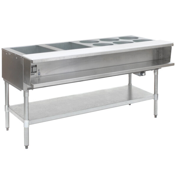 An Eagle Group stainless steel natural gas steam table with galvanized legs on a counter.