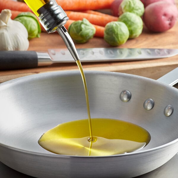100% Non-GMO Sunflower Oil being poured into a bowl.