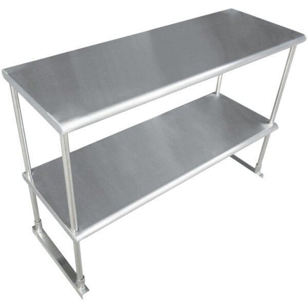 A silver stainless steel double deck overshelf on an Advance Tabco work table.