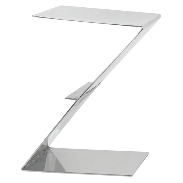 A metal display riser with a z-shaped base.