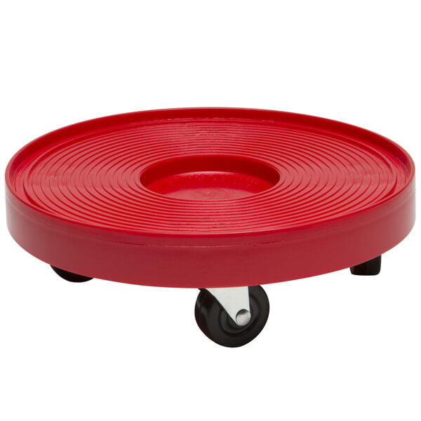 A red plastic wheel with black casters attached to it.