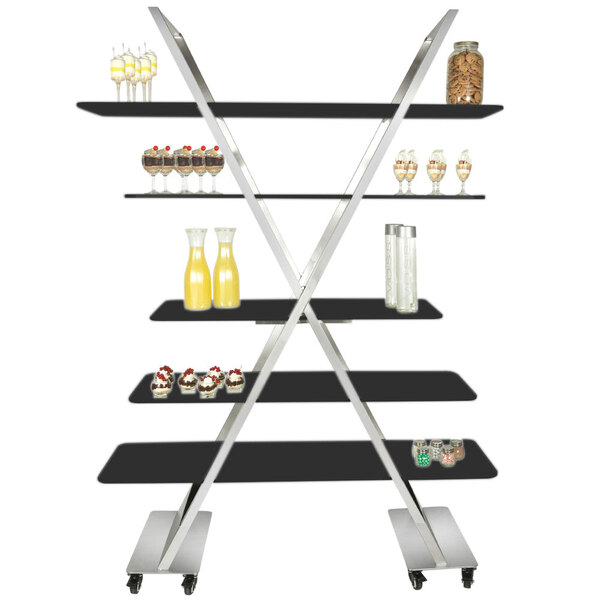 An Eastern Tabletop stainless steel rolling buffet with black shelves holding drinks and snacks.