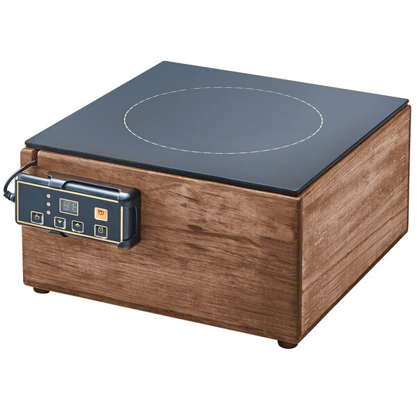 A Cal-Mil walnut countertop induction cooker with a black surface.