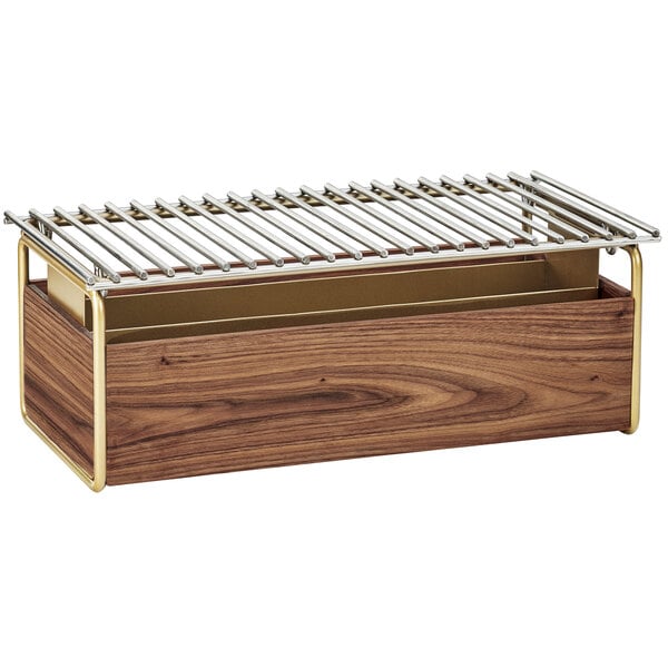 A wooden and brass Cal-Mil chafer alternative with a metal grate.