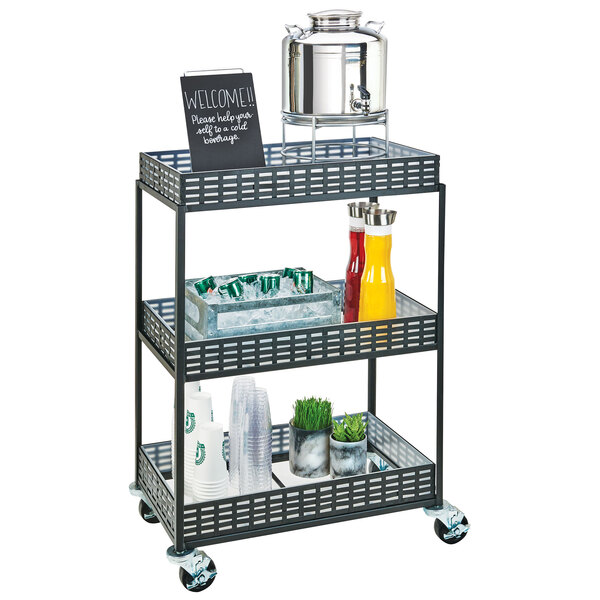 A black Cal-Mil iron beverage cart with drinks and beverages on it.