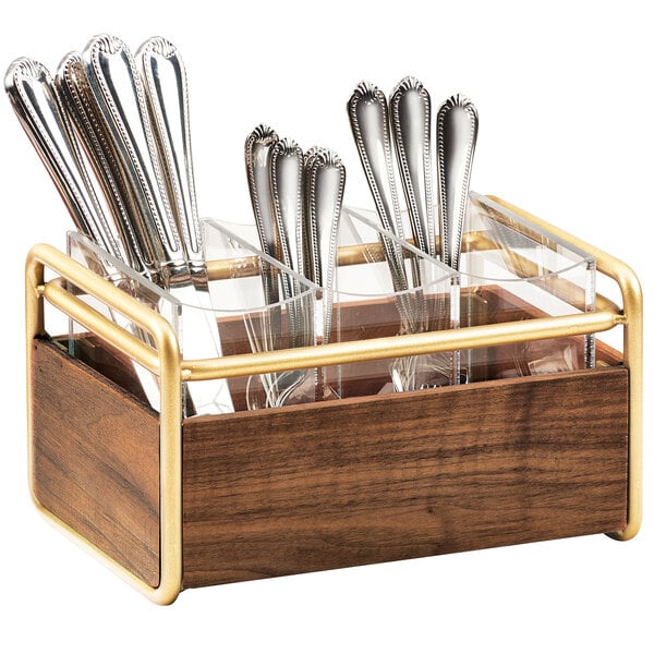 A wooden container with a Cal-Mil Mid-Century flatware organizer holding spoons and forks.