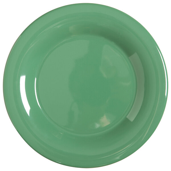 A close-up of a green GET Diamond Mardi Gras melamine plate with a white edge.