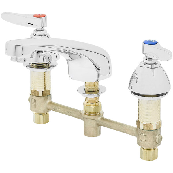 A T&amp;S deck mount medical faucet with two lever handles and two spouts.