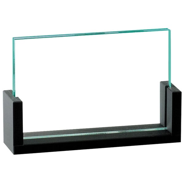 A black rectangular U-frame displayette on a clear glass shelf.
