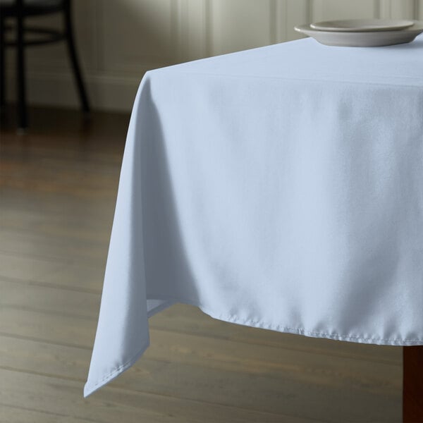 Intedge 54" x 110" Rectangular Light Blue 100% Polyester Hemmed Cloth Table Cover