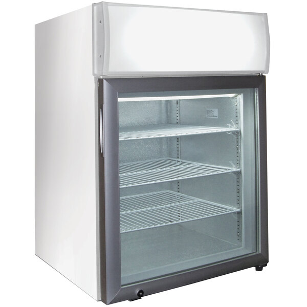 A white Excellence countertop display freezer with a glass door.