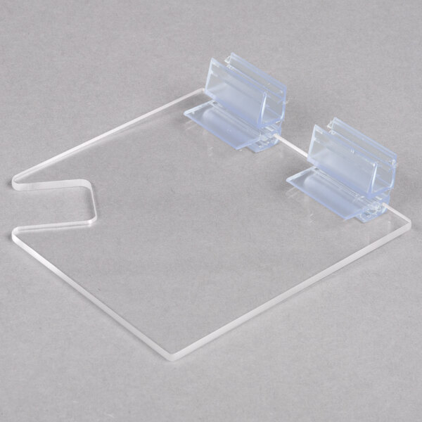 A clear plastic hinged lid with two plastic clips.