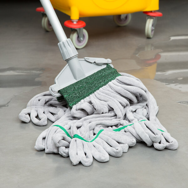 A Unger SmartColor green microfiber tube mop head on a mop.