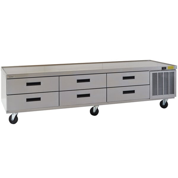 A stainless steel Delfield chef base with six drawers.