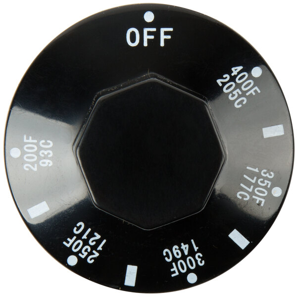A black circular thermostat knob with white numbers.